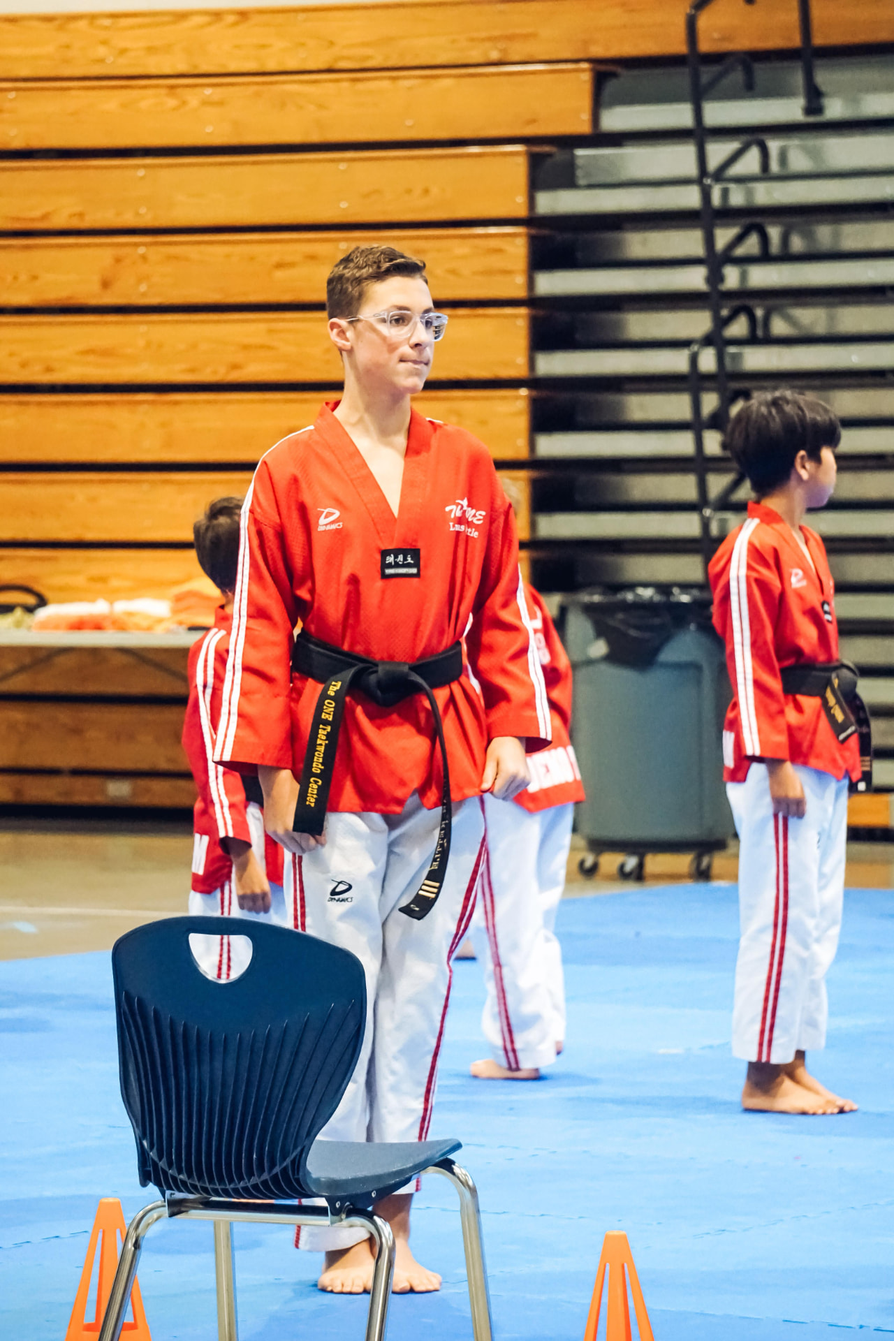 Black belt competitor standing ready before his division