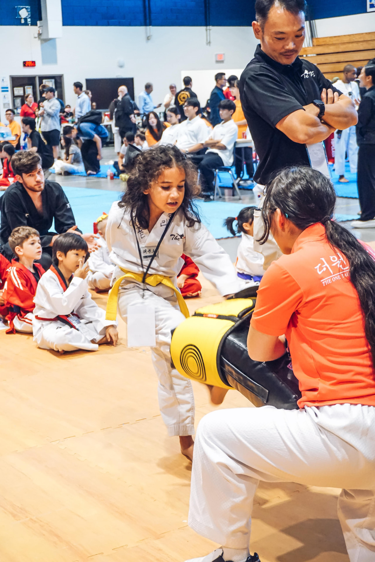 Coach encouraging a student before her event